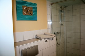 Regadera y secadora de cabello 