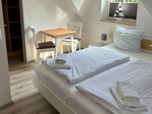 2 dormitorios, tabla de planchar con plancha, wifi