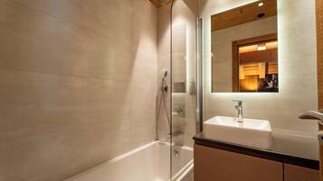 Comfort Apartment | Bathroom | Rainfall showerhead, hair dryer, bathrobes, slippers