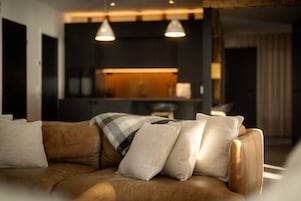 Villa | Living area | 55-cm flat-screen TV with digital channels
