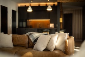 Villa | Living area | 55-cm flat-screen TV with digital channels