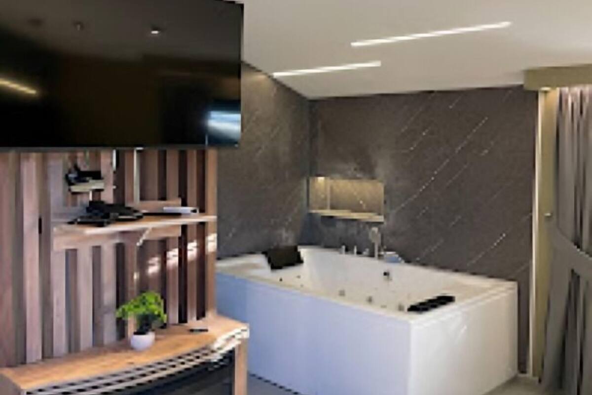 Phòng Suite Deluxe, ban công, quang cảnh núi | Bồn tắm thủy lực