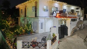 A two-story building with a sign reading "Hotel ATITI". - Hotel Atithi Mount Abu (Mount Abu)