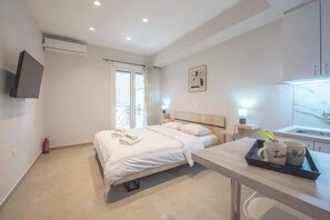 1 habitación, tabla de planchar con plancha, wifi y ropa de cama 