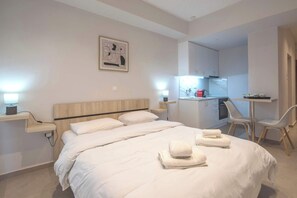 1 habitación, tabla de planchar con plancha, wifi y ropa de cama 