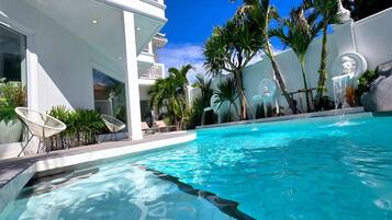 Outdoor pool, sun loungers