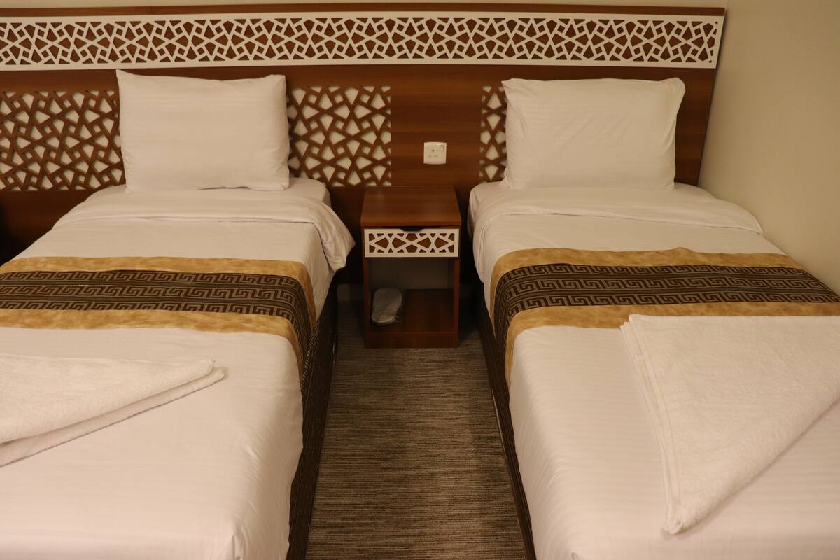 ห้องลักซ์ชัวรี่ดับเบิลหรือทวิน | เครื่องนอนระดับพรีเมียม, ผ้านวมขนเป็ด, เตียงพร้อมฟูกเสริมที่นอน