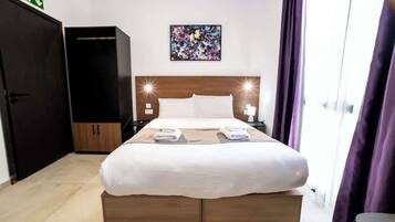 1 slaapkamer, een strijkplank/strijkijzer, wifi, beddengoed