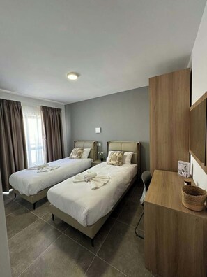 2 dormitorios, tabla de planchar con plancha, wifi y ropa de cama