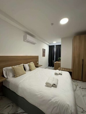 2 chambres, fer et planche à repasser, Wi-Fi, draps fournis