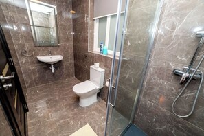 Douche, sĂšche-cheveux