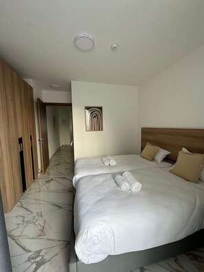 2 chambres, fer et planche à repasser, Wi-Fi, draps fournis