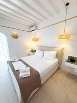 Suite Junior | Una cassaforte in camera, postazione laptop, tende oscuranti