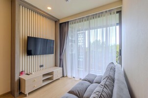 Apartamento, balcón | Zona de estar