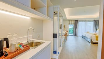 Deluxe Triple Room, Balcony | Minibar