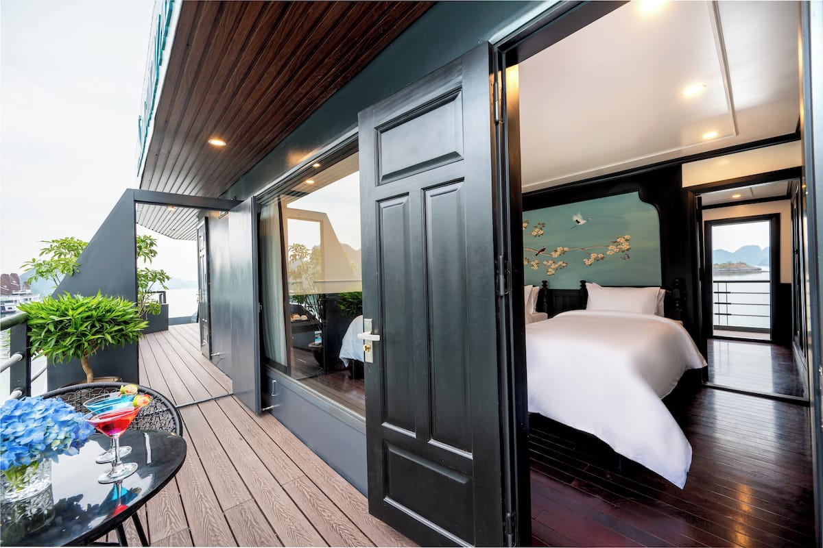 Family Quadruple Room | Minibar, in-room safe, individually furnished, desk