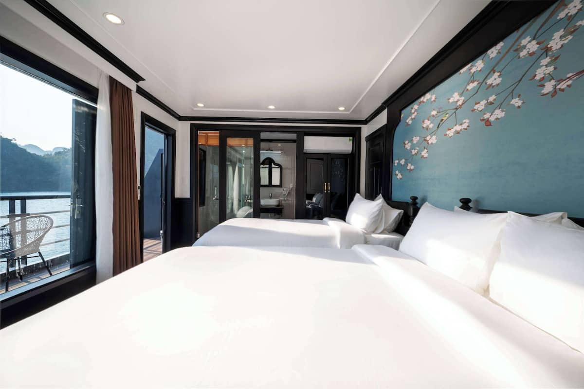 Panoramic Triple Room, Balcony, Beach View | Minibar, in-room safe, individually furnished, desk