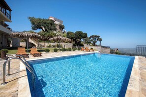 2 outdoor pools, sun loungers