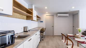 Apartment, Balcony | Private kitchenette | Electric kettle