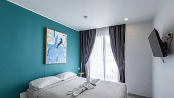 Appartement, balkon | Een kluis op de kamer, verduisterende gordijnen