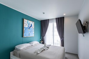 Apartment, Balcony | In-room safe, blackout curtains, iron/ironing board, free WiFi