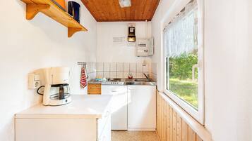Fridge, stovetop, coffee/tea maker, electric kettle