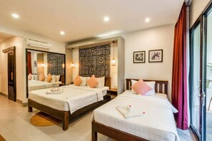 Habitación familiar | Sábanas de algodón egipcio, ropa de cama de alta calidad y minibar 