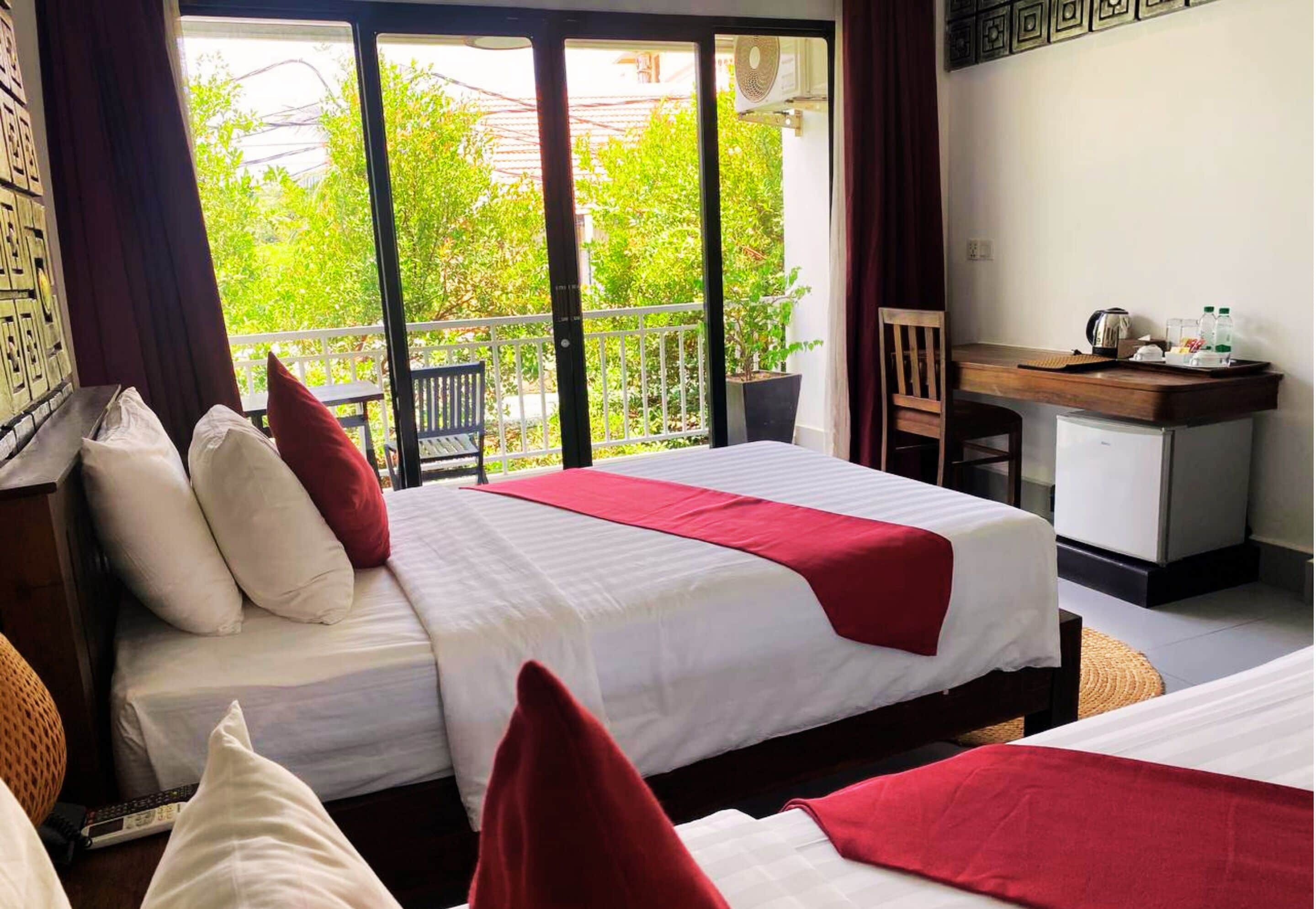 Habitación Deluxe con 2 camas individuales | Sábanas de algodón egipcio, ropa de cama de alta calidad y minibar 