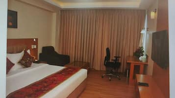 Premium Room | In-room safe, desk, laptop workspace, blackout curtains