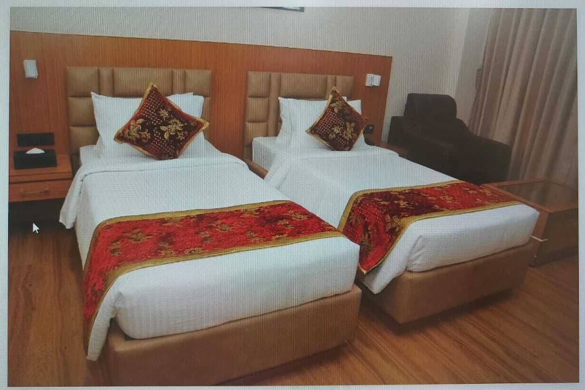 Premium Double Room, City View | In-room safe, desk, laptop workspace, blackout drapes