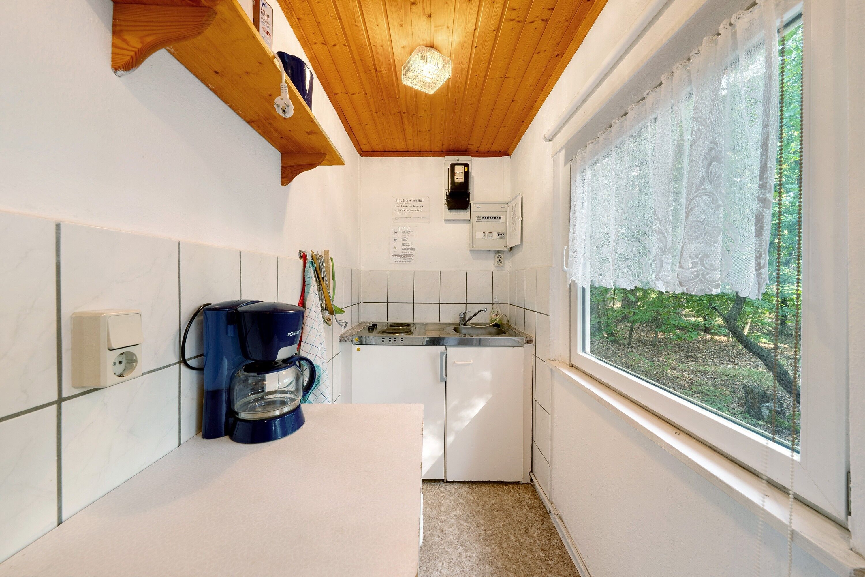 Fridge, stovetop, coffee/tea maker, electric kettle