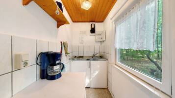 Fridge, stovetop, coffee/tea maker, electric kettle