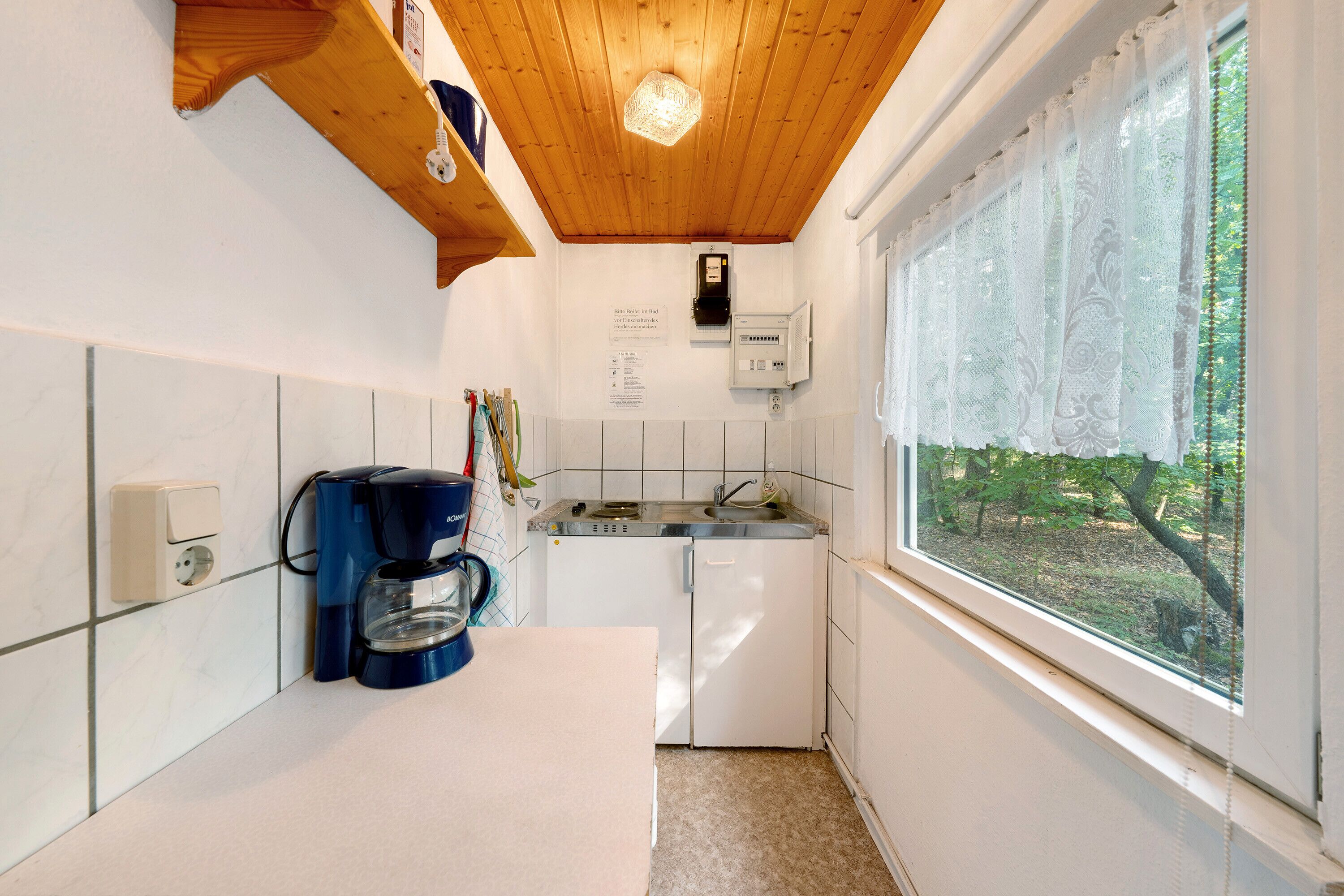 Fridge, stovetop, coffee/tea maker, electric kettle