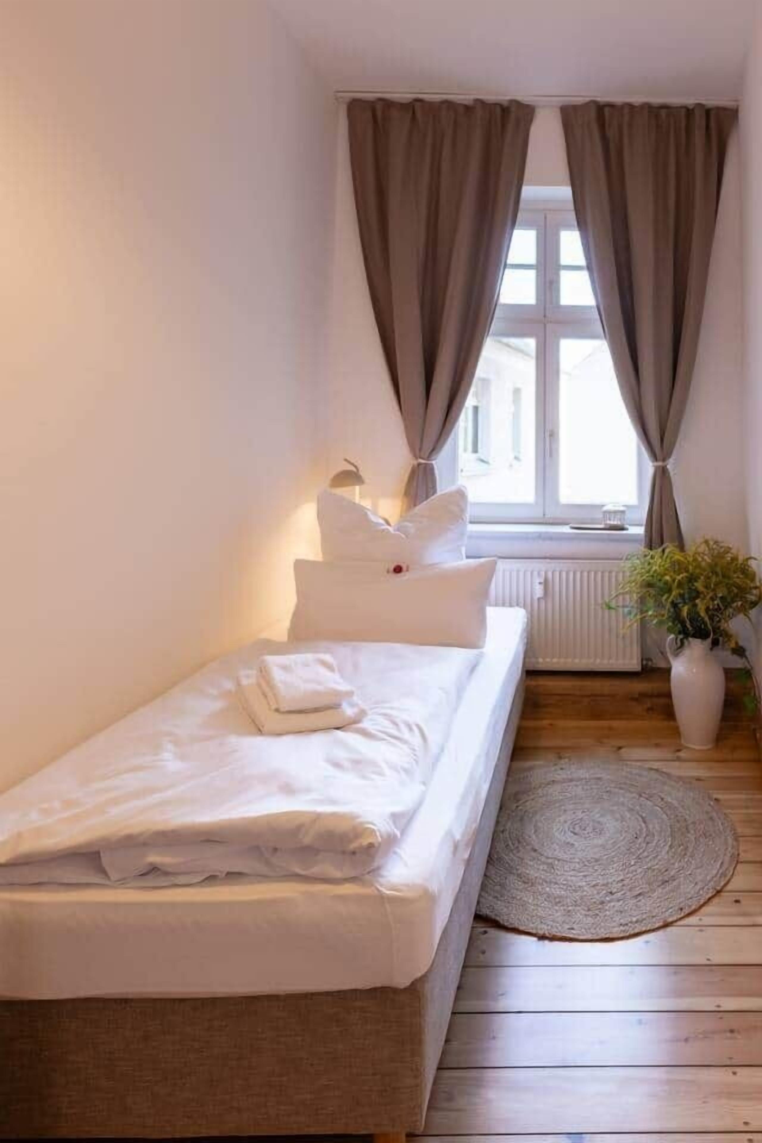 2 dormitorios, tabla de planchar con plancha, wifi y ropa de cama