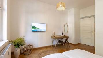 1 slaapkamer, een strijkplank/strijkijzer, wifi, beddengoed