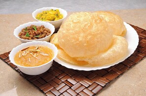 Daily buffet breakfast (INR 150 per person)