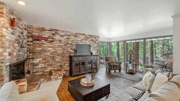 TV, fireplace, books, offices