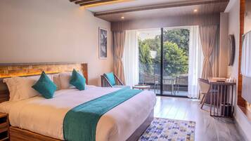 Deluxe Double Room, City View | In-room safe, desk, laptop workspace, iron/ironing board