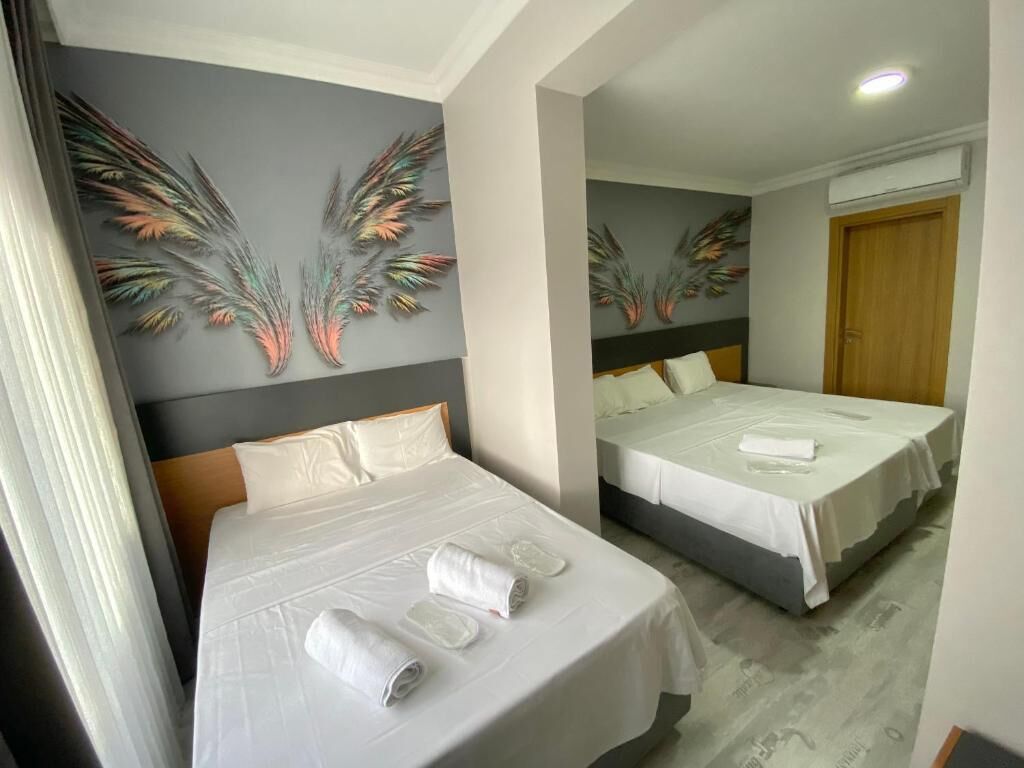 Familien-Vierbettzimmer | Laptopgeeigneter Arbeitsplatz, kostenloses WLAN