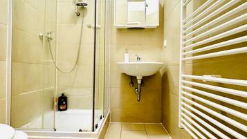 Hair dryer, towels, soap, shampoo