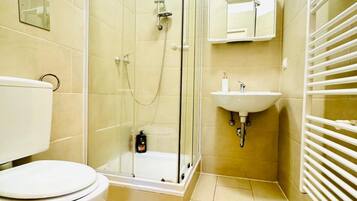 Hair dryer, towels, soap, shampoo