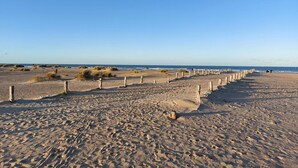 A sandy beach with wooden posts forming a path, leading to the ocean. - Stunning home in Zutkerque with WiFi (Zutkerque)