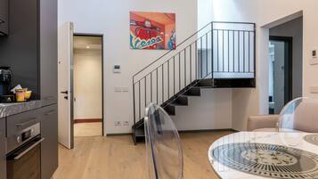 Apartment, 2 Bedrooms | Living area | 40-inch TV with digital channels