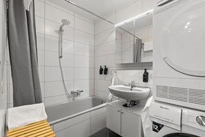 Hair dryer, towels, soap, toilet paper
