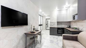 Classic-Apartment | Wohnbereich | 40-Zoll-LCD-Fernseher mit Digitalempfang