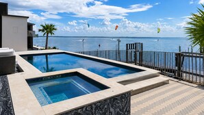 A swimming pool with a view of the sea and sky. - Las Velas Village Luxury with a view (South Padre Island)