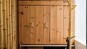 A wooden wardrobe with multiple doors and a coat rack beside it. - new opened! 4 minutes from Shijo Omiya station, best value bungalow, shower toilet separate (Kyoto)