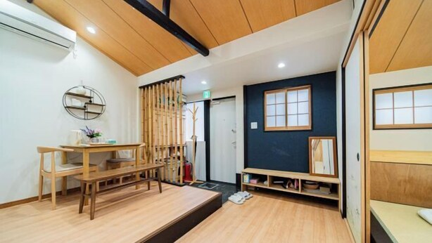 A room with a wooden floor, a desk with a chair, a bed, and a window. - new opened! 4 minutes from Shijo Omiya station, best value bungalow, shower toilet separate (Kyoto)