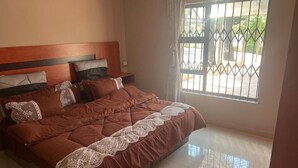 Desk, laptop workspace, cribs (free), WiFi (free)