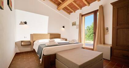 Chambre 'Santa Lorica - Camera 22' avec piscine partagée, Wi-Fi et climatisation